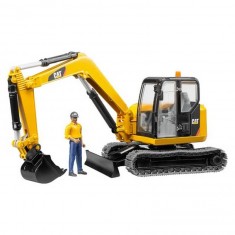 Caterpillar mini excavator with worker