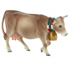 Alpine cow figurine with bell