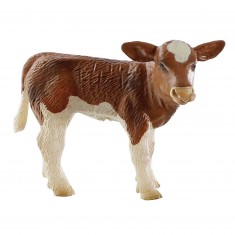 Brown/white cow figurine: Calf