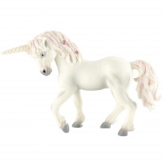 Figura unicornio con la cabeza gacha.