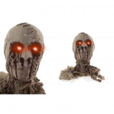 Mummy head with glowing eyes