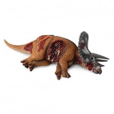 Figura de dinosaurio: Triceratops tumbado