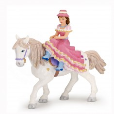 Figura de jinete con sombrero y caballo.