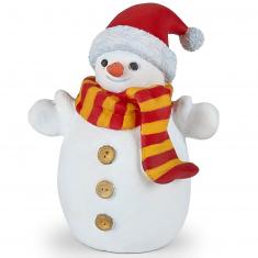 Figura de muñeco de nieve con sombrero.
