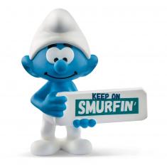 Smurf figurine and his Smurfin' sign