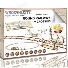 Maqueta de madera: rieles de tren y cruce